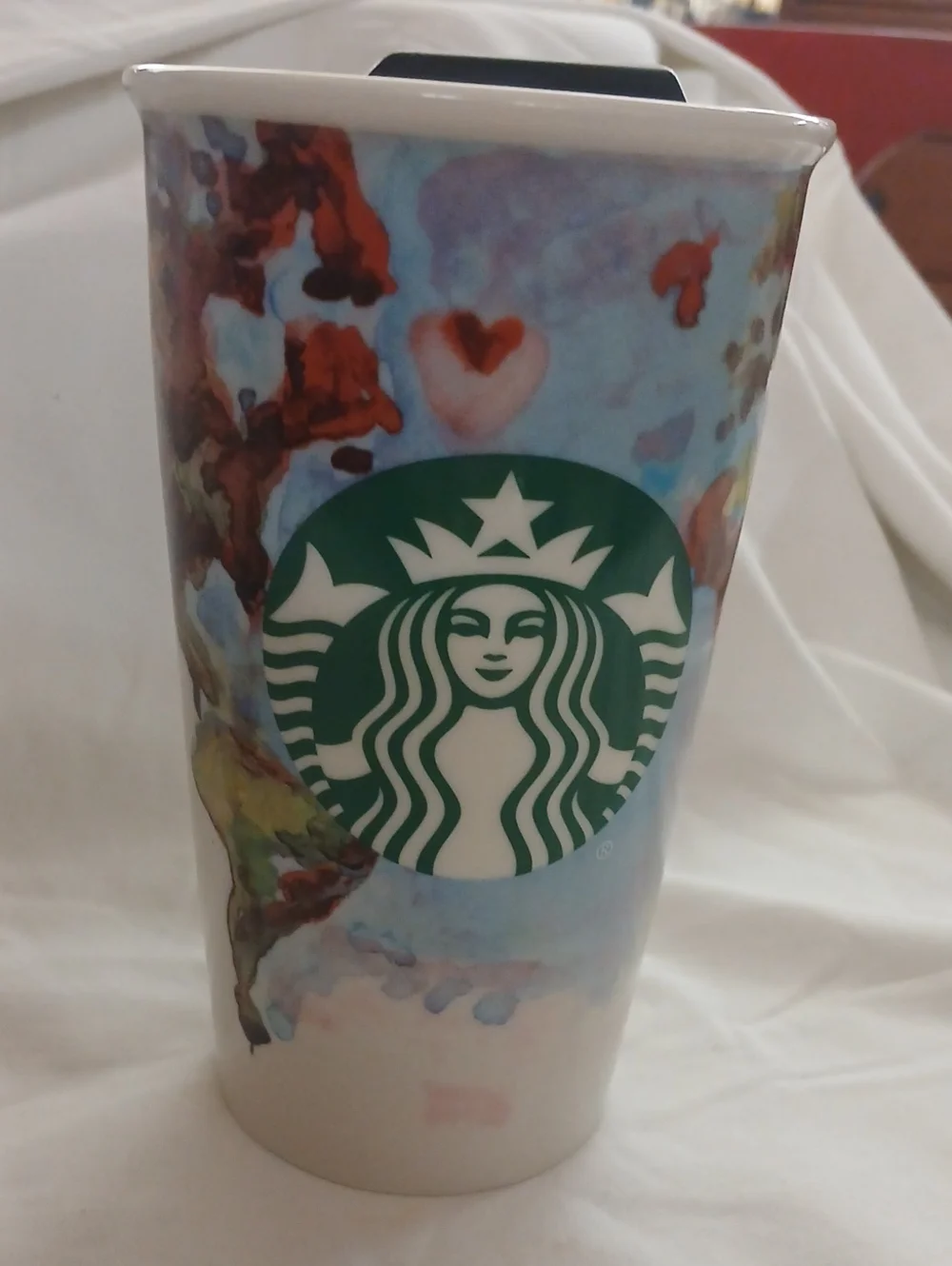 Starbucks Blue and Green Watercolor Ceramic Travel Mug with Red Accents